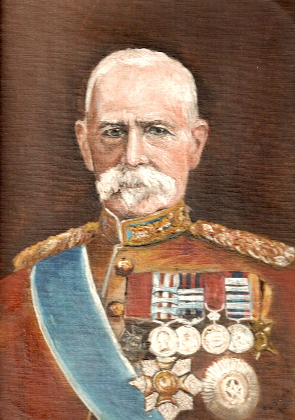 Portrait of a man in military uniform adorned with medals and a ceremonial sash.